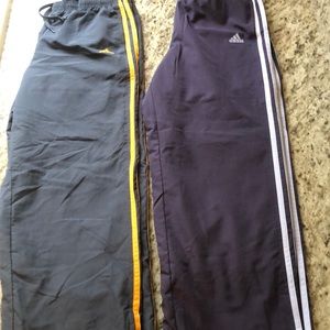 Adidas track pants. Two pairs
